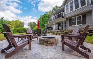 A fire pit and siting area done by ATM Contracting LLC.