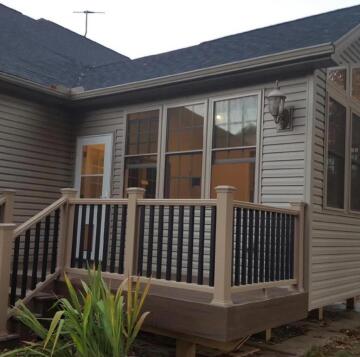 A porch made modern by ATM Contracting LLC.